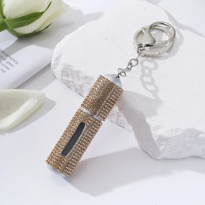 Creative Diamond-encrusted Keychain Mini Perfume Metal Bottom Hot-selling Keychain Charging Bottling Women Key Chain Ring Gift