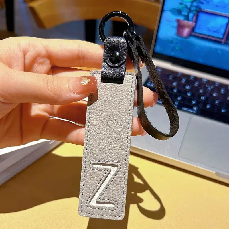 Popular A-Z 26 Letter Leather Keychain Engraved Custom Logo Name with Handbag Keyring for Woman Man Moto Car Key Ring Chain Gift
