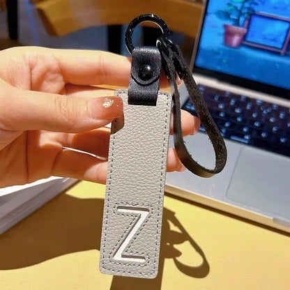 Popular A-Z 26 Letter Leather Keychain Engraved Custom Logo Name with Handbag Keyring for Woman Man Moto Car Key Ring Chain Gift